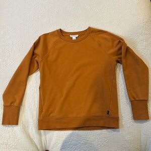 Athleta dusty orange sweatshirt size medium.